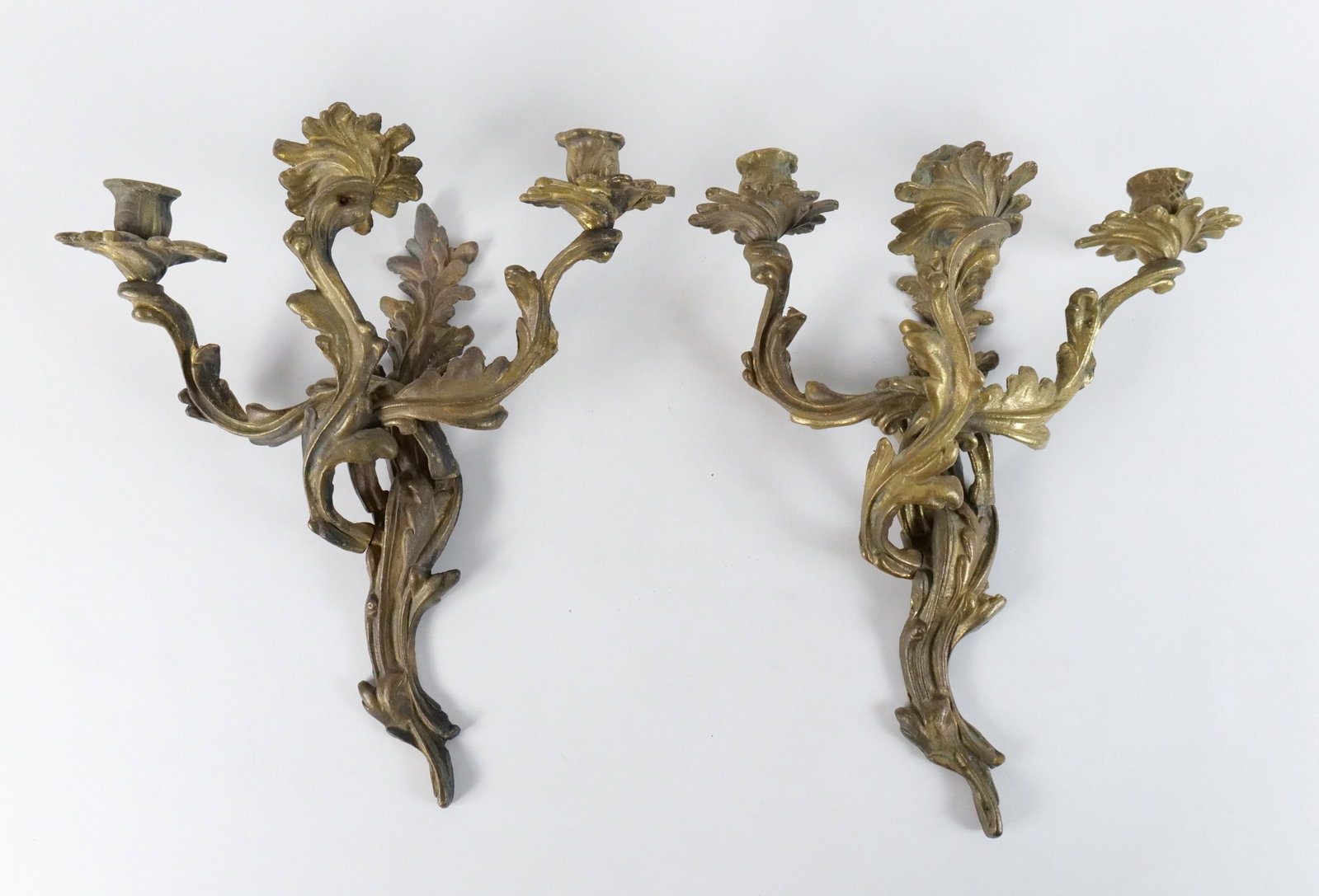 Pair of Bronze Wall Sconce Candelabras: Pair of Bronze Wall Sconce Candelabras. Circa late 20th century. Measures 16" long x 14" wide x 7" deep. All invoices must be paid within 24 hours of the sale. We offer multiple shipping options pleas