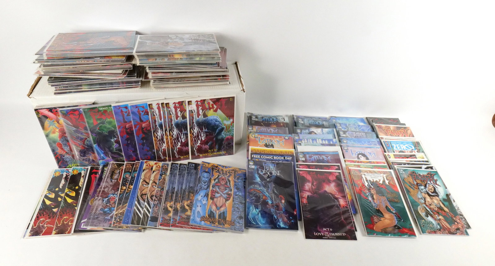 Long Box of Titles - Fathom and Faust: Long Box of Titles - All Fathom and Faust. Includes tons of multiples and Variants. Also includes Autographed Faust and Night Vision Comic. The photographs do not show all comics in the lot. The colle
