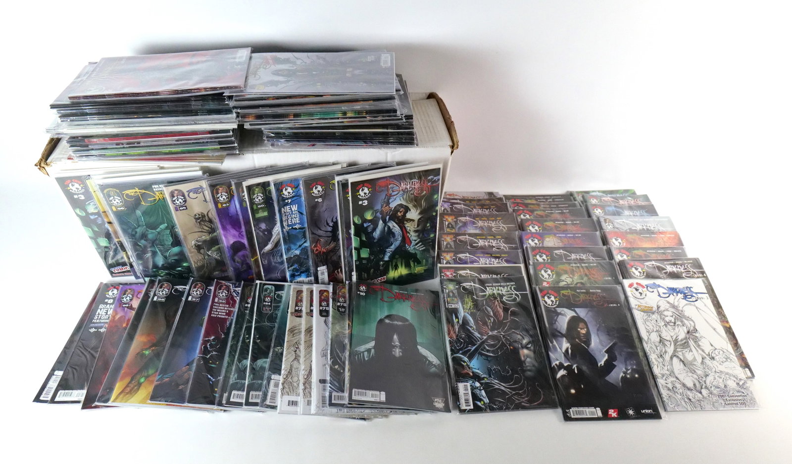 Long Box of The Darkness Comics: Long Box of The Darkness Comics. Including Vol. 2 #19-24 with multiples and variants, Darkness First Look with multiples, Darkness Levels #1-5, Darkness (Vol. 3) #1-10 and #75-105. Includes many multi