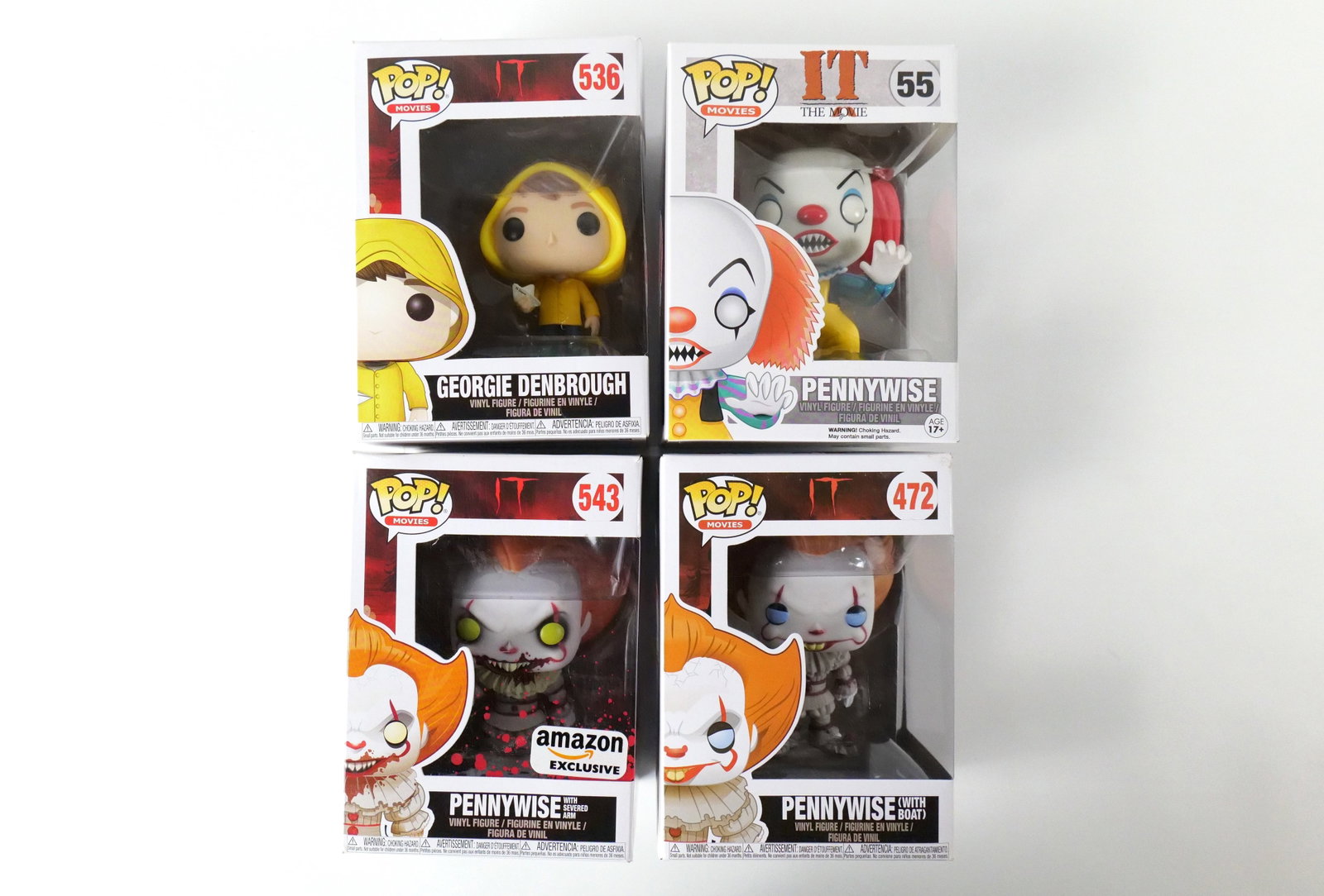 Lot of 4 Funko IT Pops: Lot of 4 Funko IT Pops. Including Pennywise #55, Pennywise with Boat #472 Georgie Denbrough #536, and Pennywise with Severed Arm #543 - Amazon Exclusive. All new in boxes. All invoices must be paid wi