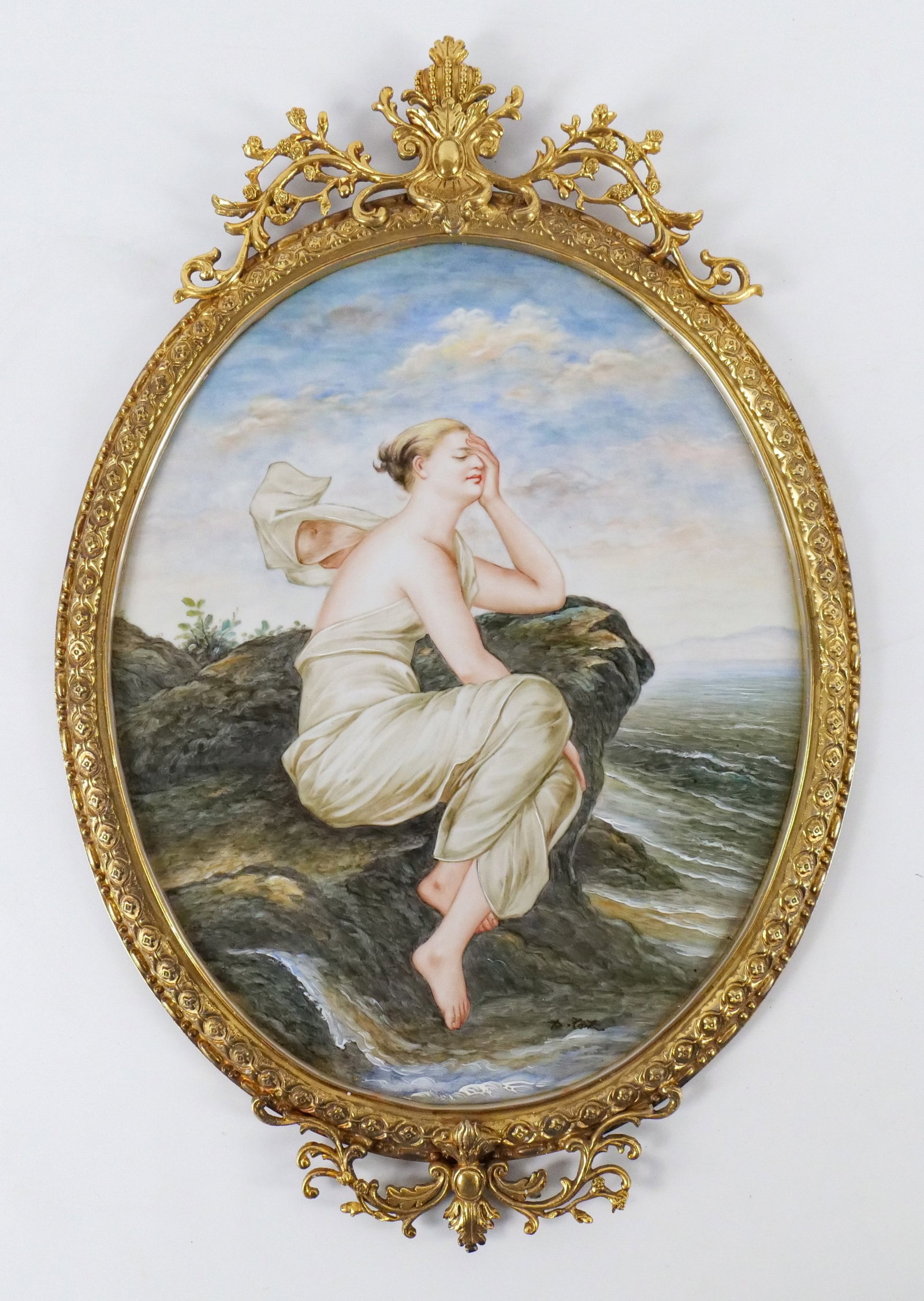 Hand Painted Limoges Style Plaque: Hand Painted Limoges Style Plaque. Depicting a woman seated on a rock near the ocean. Comes in nice brass oval decorative frame. Artist signed lower right. Circa late 20th century. Professionally matt
