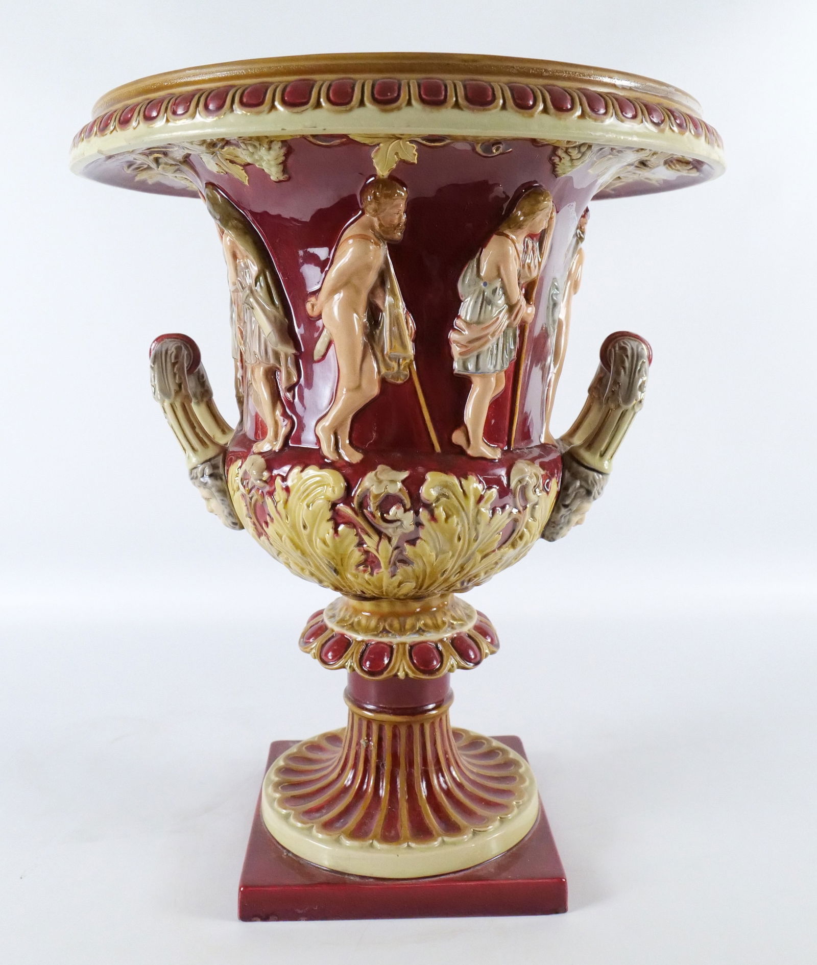 Majolica Decorative Urn Planter: Majolica Decorative Urn Planter. Depicting an Italian Scene. Base of pedestal has a break and needs to be reglued - Being held in by the nut and bolt. Base also has a chip. Rim has been repaired. Circ