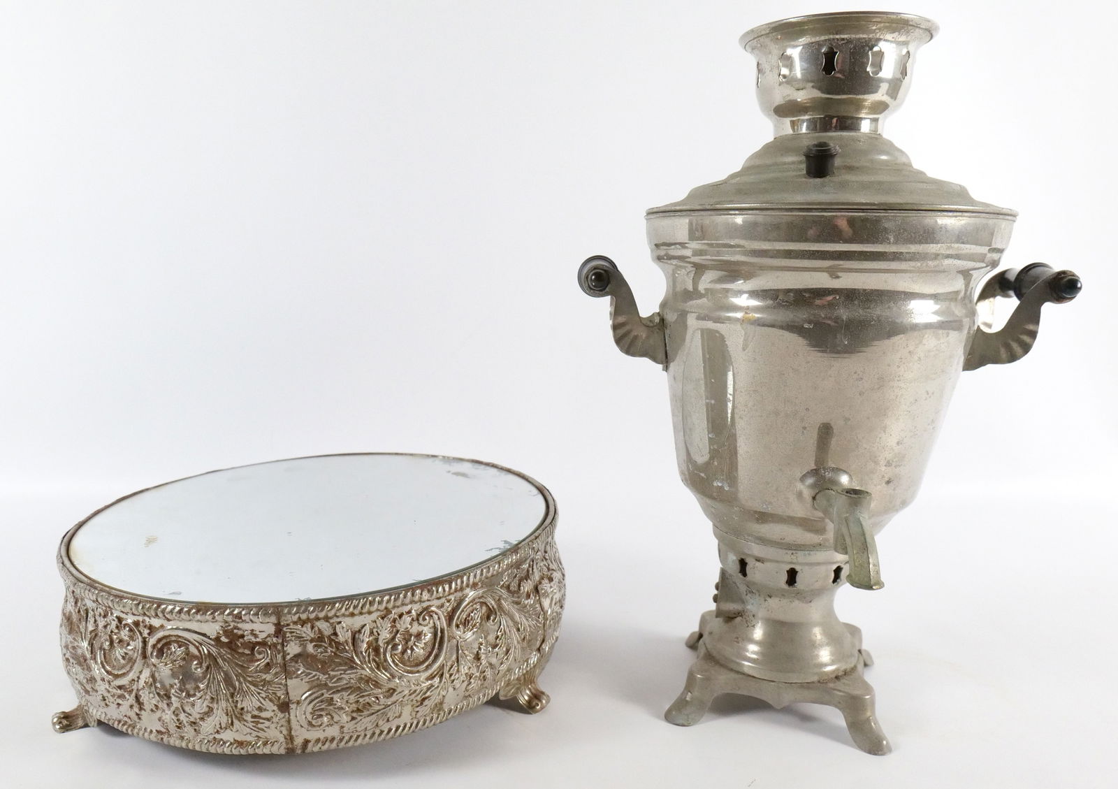 Group Lot of Metal Items: Group Lot of Metal Items including Russian Samovar - Missing Spout and Silverplated Mirror Top Trivet. Largest measures 16" tall x 11" wide. All invoices must be paid within 24 hours of the sale. We o