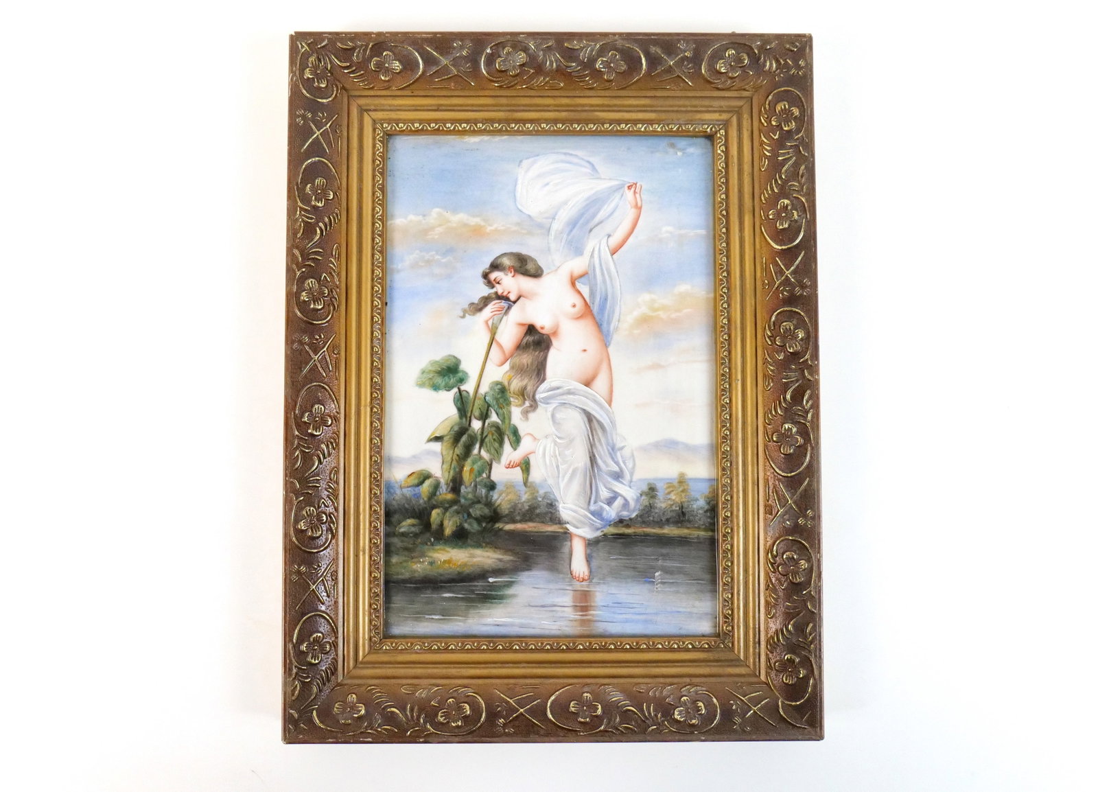Limoges Style Framed Porcelain Plaque: Limoges Style Framed Porcelain Plaque. Hand Painted depicting a nude woman smelling a flower. Backing is glued on. Not sure of age or if marked. Most likely Circa 1970's. Measures 14.5" tall x 11" wid