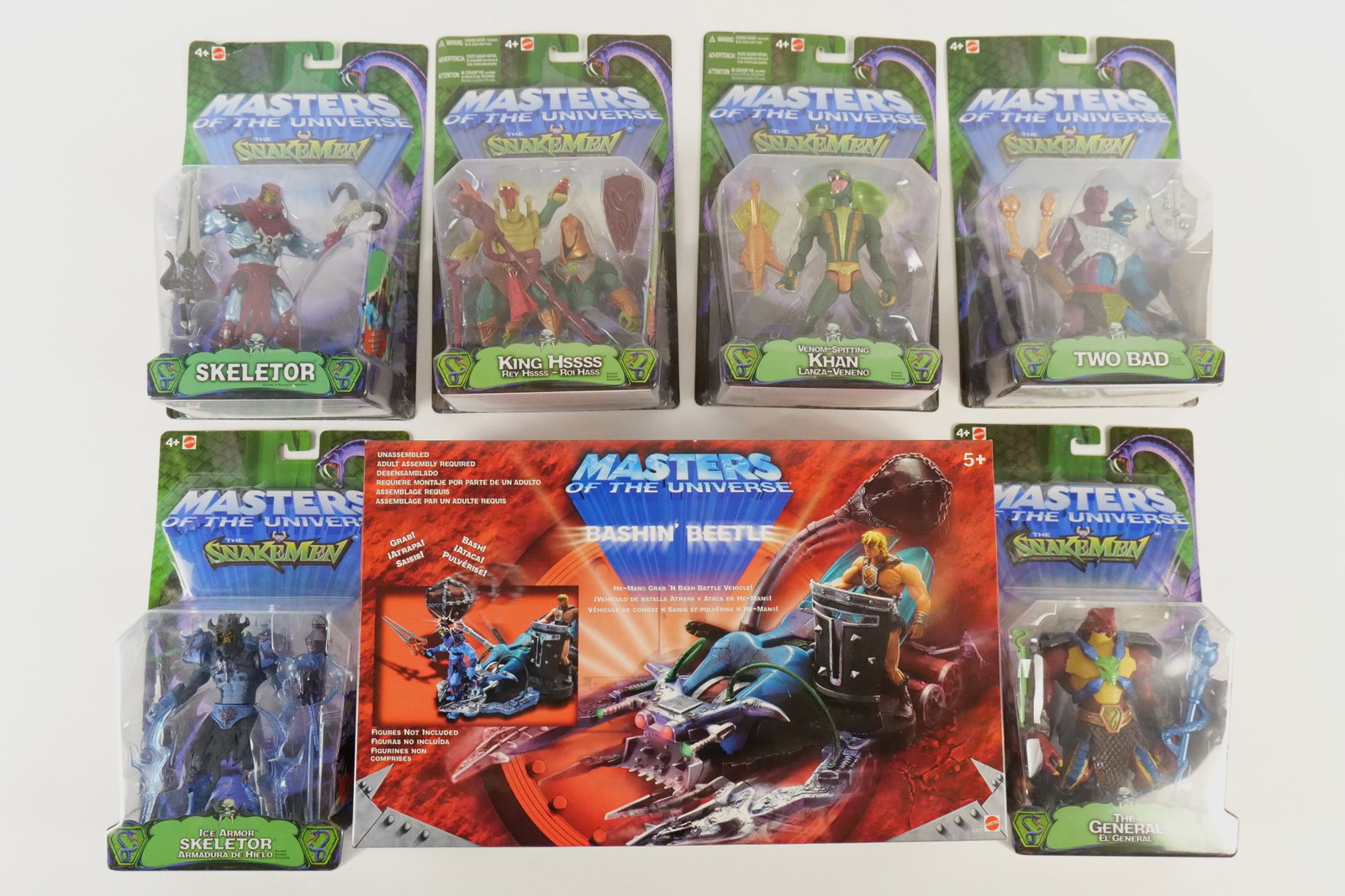 Group of Masters of the Universe Figures: Group of Masters of the Universe figures including MOTU vs SnakeMen - The General, King Hssss, Ice Armor Skeletor, Two Bad, Venom Spitting Khan and Skeletor. Also included is MOTU Bashin Beetle. All i