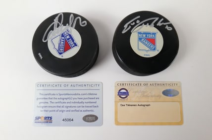 Lot of 2 New York Rangers Signed Hockey Pucks