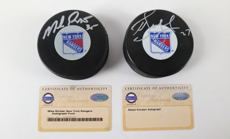 Lot of 2 New York Rangers Autographed Hockey Pucks