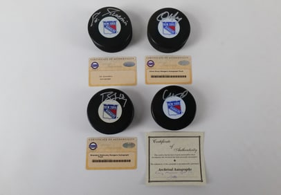 Lot of 4 New York Rangers Autographed Hockey Pucks