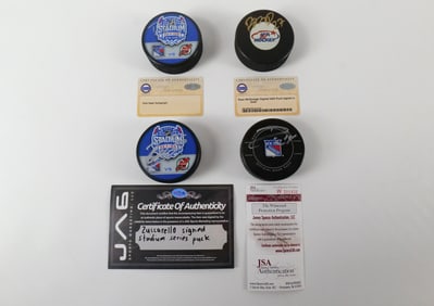 Lot of 4 New York Rangers Autographed Hockey Pucks