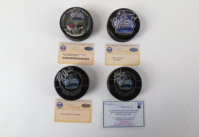 Lot of 4 Winter Classic Autograph Hockey Pucks