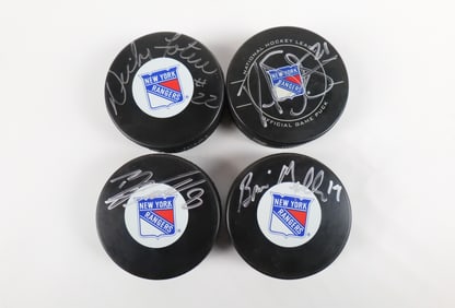 Lot of 4 New York Rangers Autographed Hockey Pucks