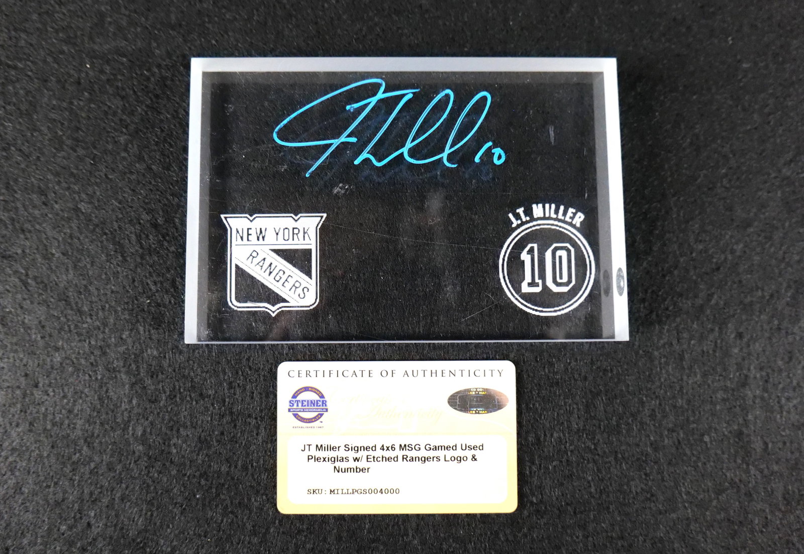 New York Rangers JT Miller Signed MSG Game Used Plexiglas: New York Rangers JT Miller Signed 4x6 MSG Game Used Plexiglas w/Etched Rangers Logo and Number. Comes with COA from Steiner. All invoices must be paid within 24 hours of the sale. We offer multiple sh