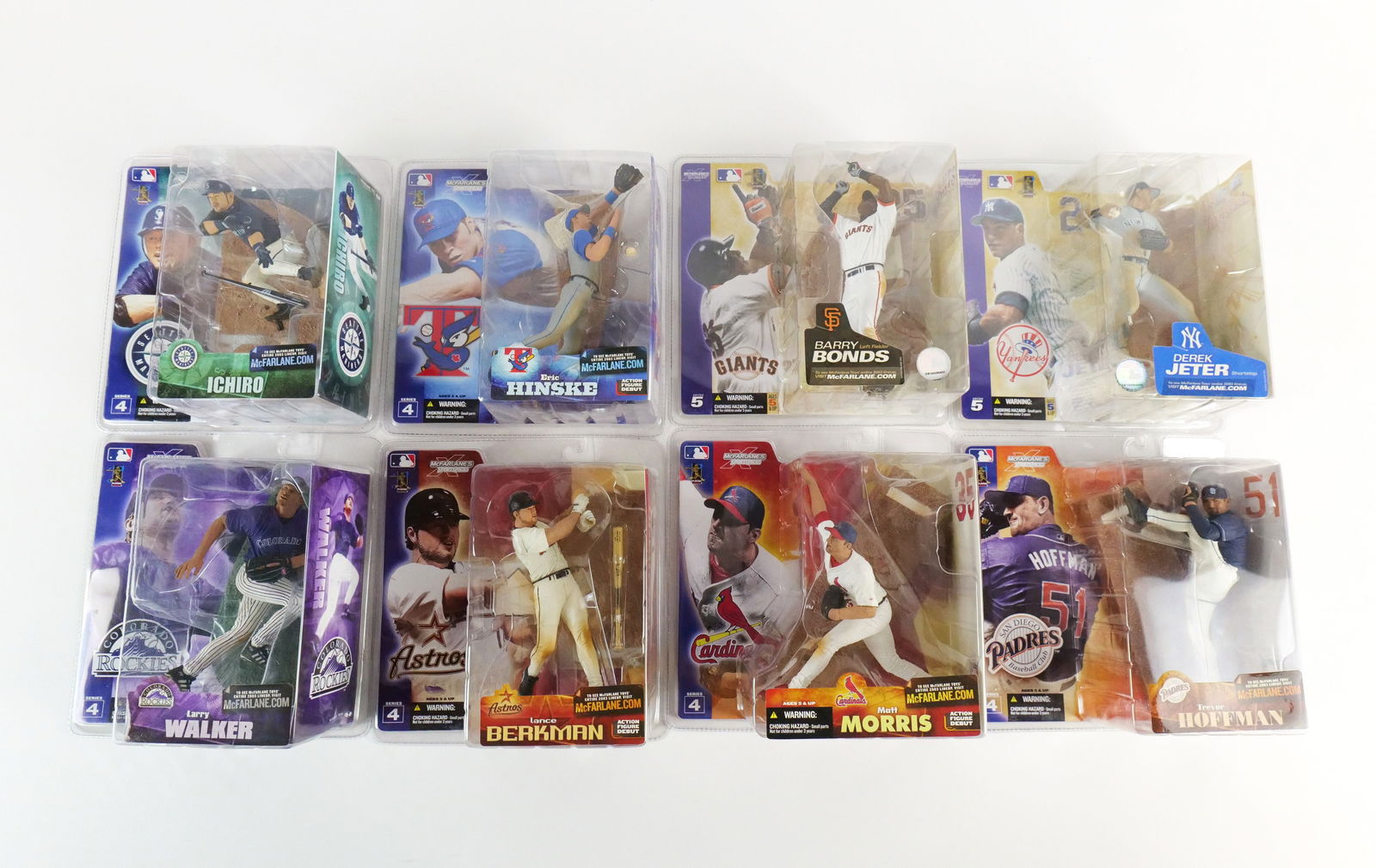 Lot of 8 McFarlane MLB Action Figures: Lot of 8 McFarlane MLB Action Figures. Including Series 4 (Ichiro, Larry Walker, Lance Berkman, Matt Morris, Trevor Hoffman, Eric Hinske) and Series 4 (Derek Jeter and Barry Bonds). All new in package