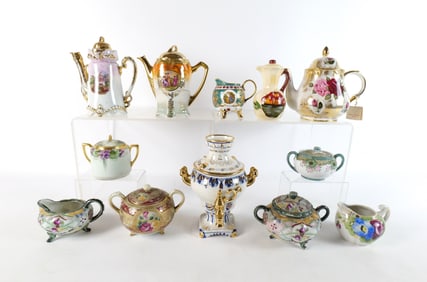 Group Lot of Various Creamers, Sugars, and Teapots