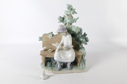 Nao Figurine - Girl on Bench Feeding Birds