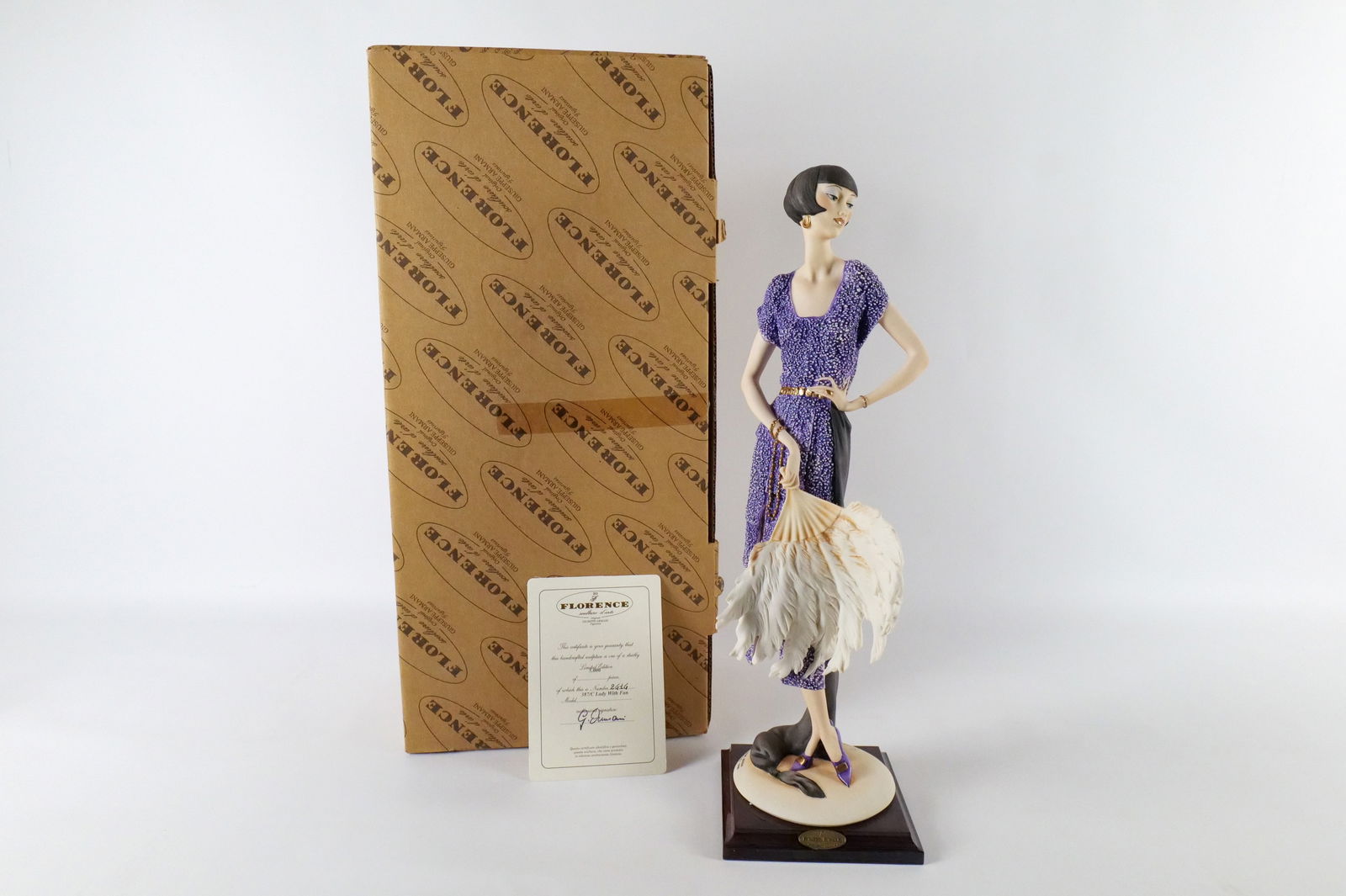 Giuseppe Armani Lady with Fan Figurine: Giuseppe Armani Lady with Fan Figurine. No. 387-C. Comes with COA and Original Box. Limited Edition #2414/5000. Measures 18.25" tall. All invoices must be paid within 24 hours of the sale. We offer mu