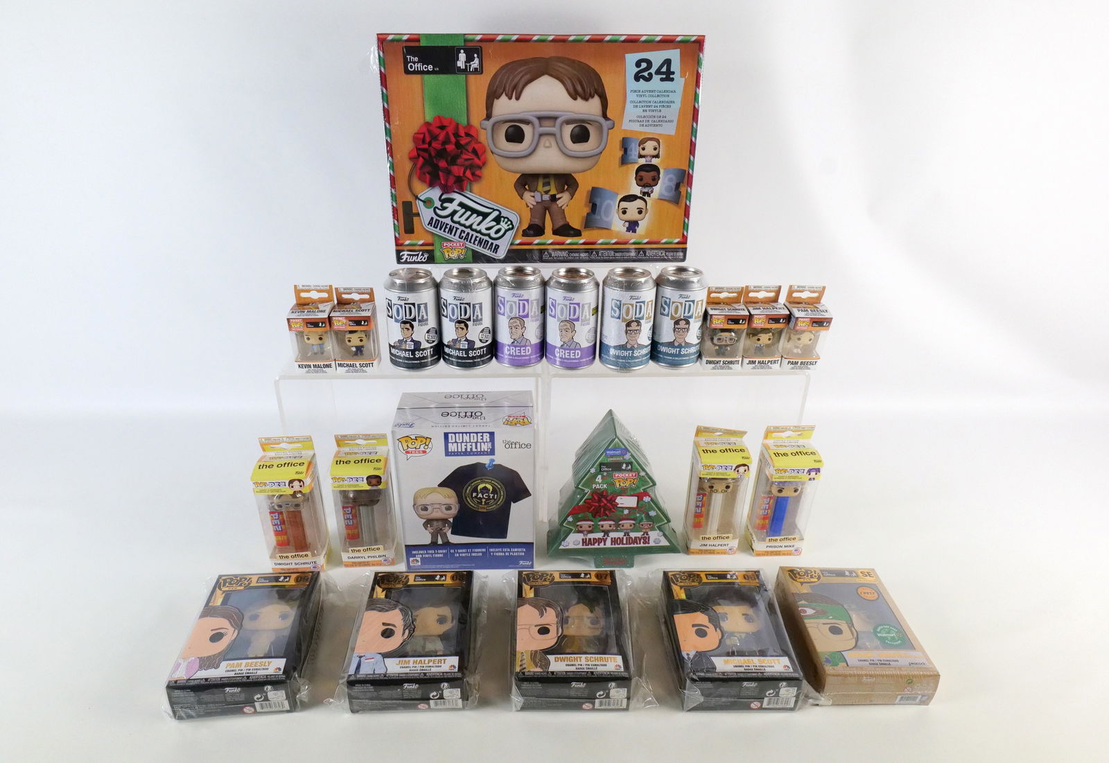 Lot of Funko The Office Collectibles: Lot of Funko The Office Collectibles. Including Soda: (2) Michael Scott, (2) Dwight Schrute, and (2) Creed, T-Shirt Size Med, Advant Calendar, (5) Pocket Pop Keychains, Holiday Pocket Pop Set, Set of