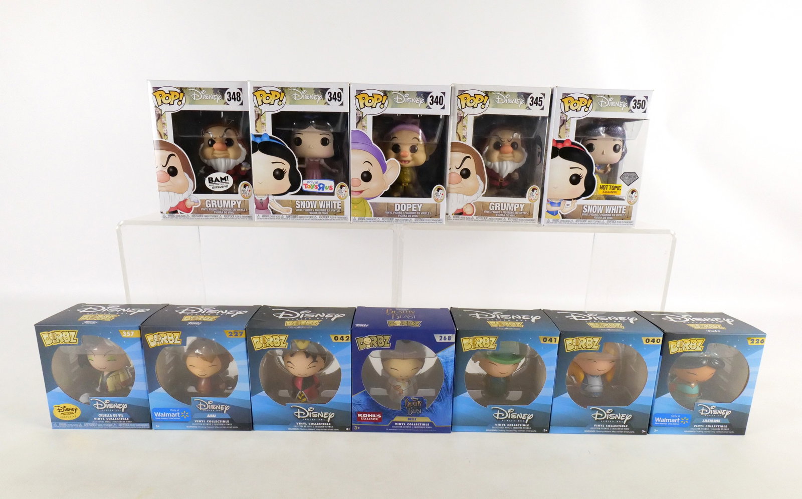 Lot of Funko Disney Collectibles: Lot of Funko Disney Collectibles. Including Snow White Pops: Dopey #340, Grumpy #345, Grumpy #348 Bam Exclusive, Snow White #349 TRU Exclusive, and Snow White #350 Hot Topic Exclusive and Dorbz: Belle