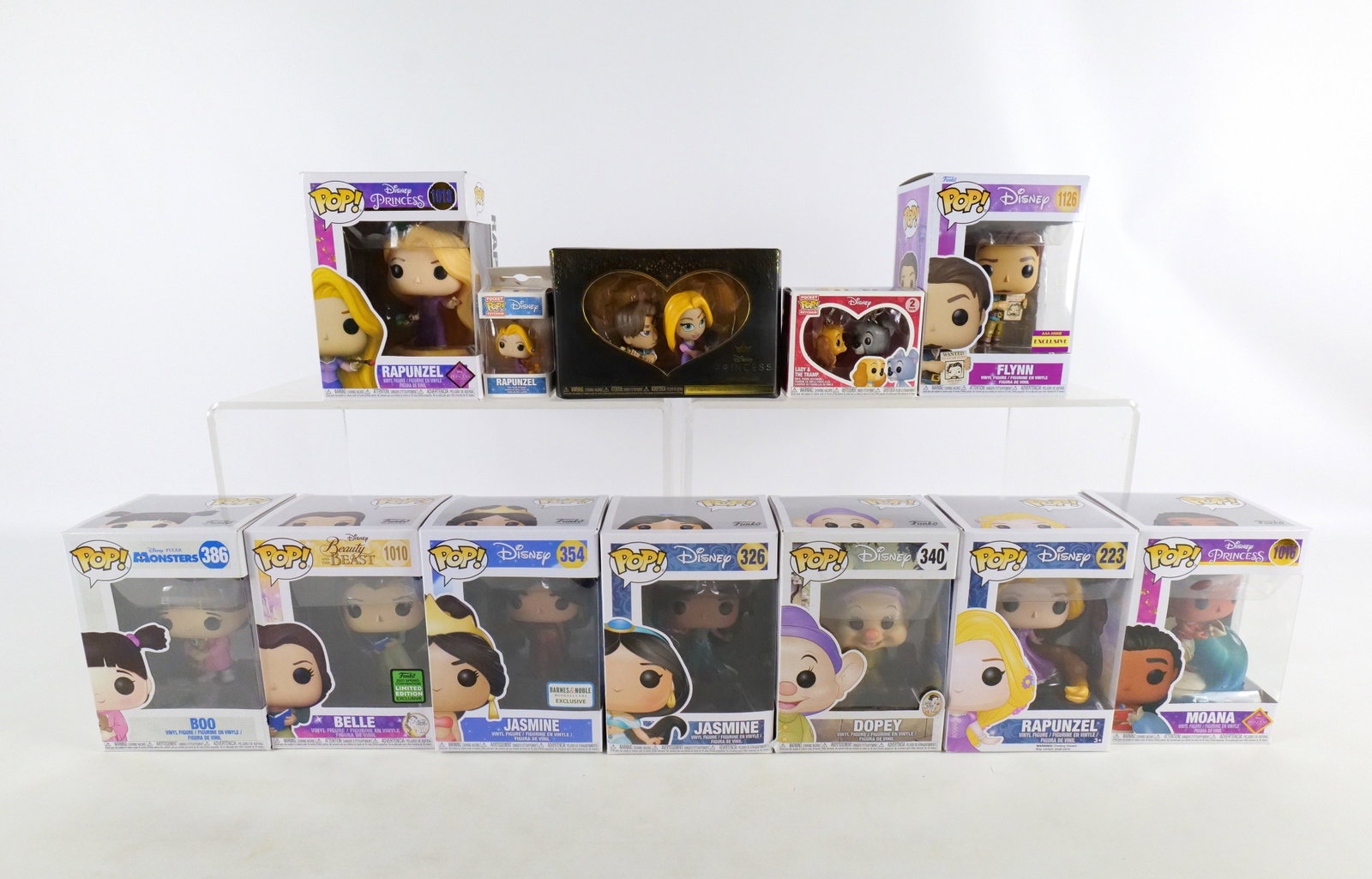 Lot of Funko Disney Collectibles: Lot of Funko Disney Collectibles. Including Rapunzel #223, Jasmine #326, Jasmine #354 Barnes & Noble Exclusive, Dopey #340, Boo #386, Beauty and the Beast: Belle #1010 Spring Convention Exclusive, Dis