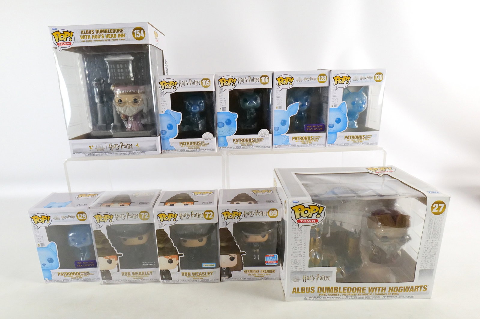 Lot of 10 Funko Harry Potter Pops: Lot of 10 Funko Harry Potter Pops. Including Albus Dumbledore with Hogwarts #27, Hermione Granger #69 Fall Convention Exclusive, Ron Weasley #72 Exclusive and FYE Exclusive, Patronus Ron Weasley #105,