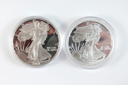 2 Silver Eagle $1