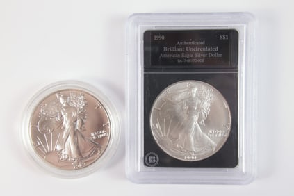 2 Silver Eagle $1
