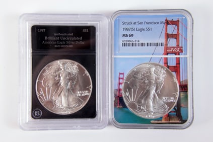 2 Silver Eagle $1