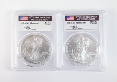 2 Silver Eagle $1