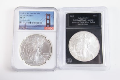 2 Silver Eagle $1