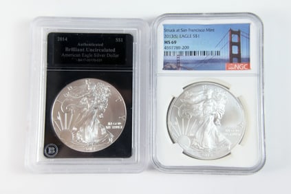 2 Silver Eagle $1