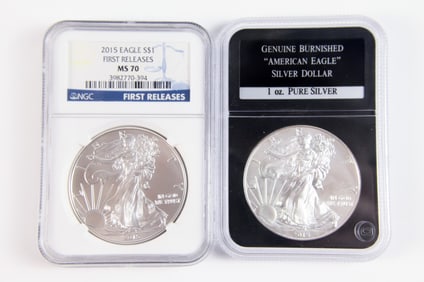 2 Silver Eagle $1