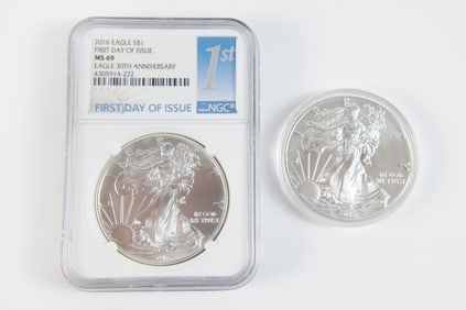 2 Silver Eagle $1