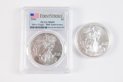 2 Silver Eagle $1
