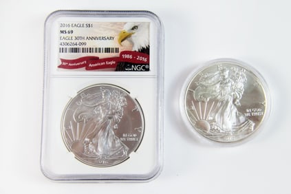 2 Silver Eagle $1