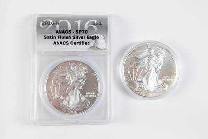 2 Silver Eagle $1