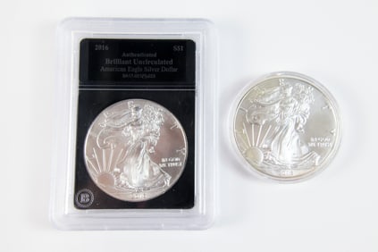 2 Silver Eagle $1