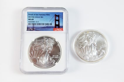 2 Silver Eagle $1
