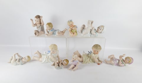 Group Lot of Bisque Piano Baby Figurines