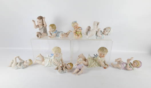 Group Lot of Bisque Piano Baby Figurines: Group Lot of Bisque Piano Baby Figurines. Antique to Vintage. Various Makers. One missing a toe but all others appear to be in good condition. Longest measures 11". All invoices must be paid within 24
