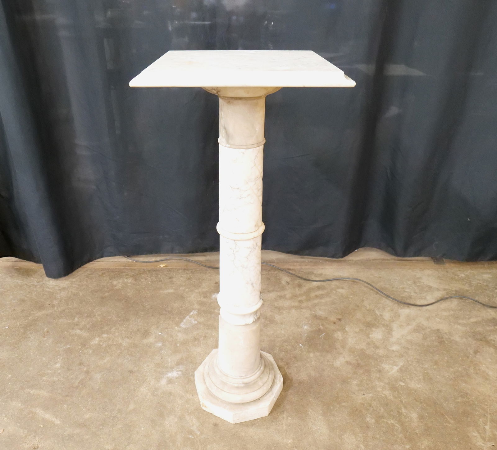Carved Alabaster Pedestal: Carved Alabaster Pedestal. Marriage - Top does not match. Some chipping on the base, heavy glue marks on the column seams so it may have been reinforced at some point and some scratching present. Circ