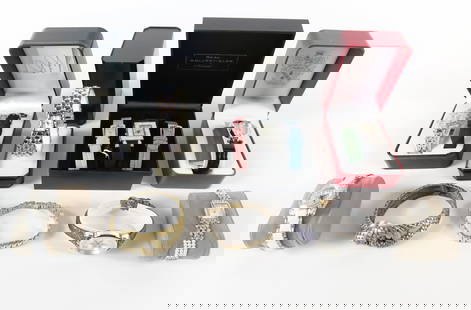 Group of Ladies Quartz Fashion Watches: Group of Ladies Quartz Fashion Watches. The lot includes a mix of modern ladies quartz fashion watches. Featuring a 7.5'' long silver tone quartz watch by Suzanne Somers with a flower shaped body,