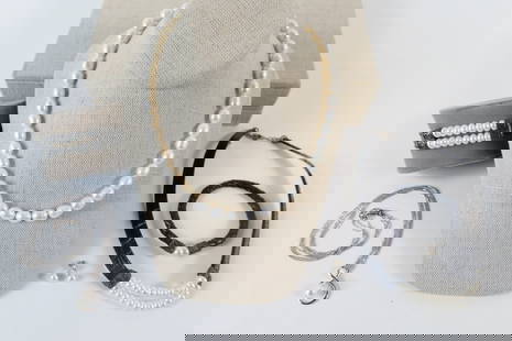 Mixed Freshwater Pearl and Sterling Jewelry: Mixed Freshwater Pearl and Sterling Jewelry. The lot includes a variety of white freshwater pearl jewelry. Featuring an 18'' long Thai made strand of white oval shaped 8mm freshwater pearls with a