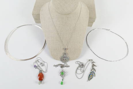 Group of Sterling Necklaces and Pendants: Group of Sterling Necklaces and Pendants. The lot includes a mix of sterling necklaces featuring a 18'' long fine sterling chain with a 3.14'' x .96''edwardian inspired sterling pendant in a lavalier