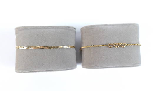 14K Braided Bracelet and 14K Anklet: 14K Braided Bracelet and 14K Anklet. The lot includes a 14K yellow gold bracelet and anklet. Featuring a 7'' long 14K yellow gold bracelet consisting of 3 braided strands of fluid chain with a spring