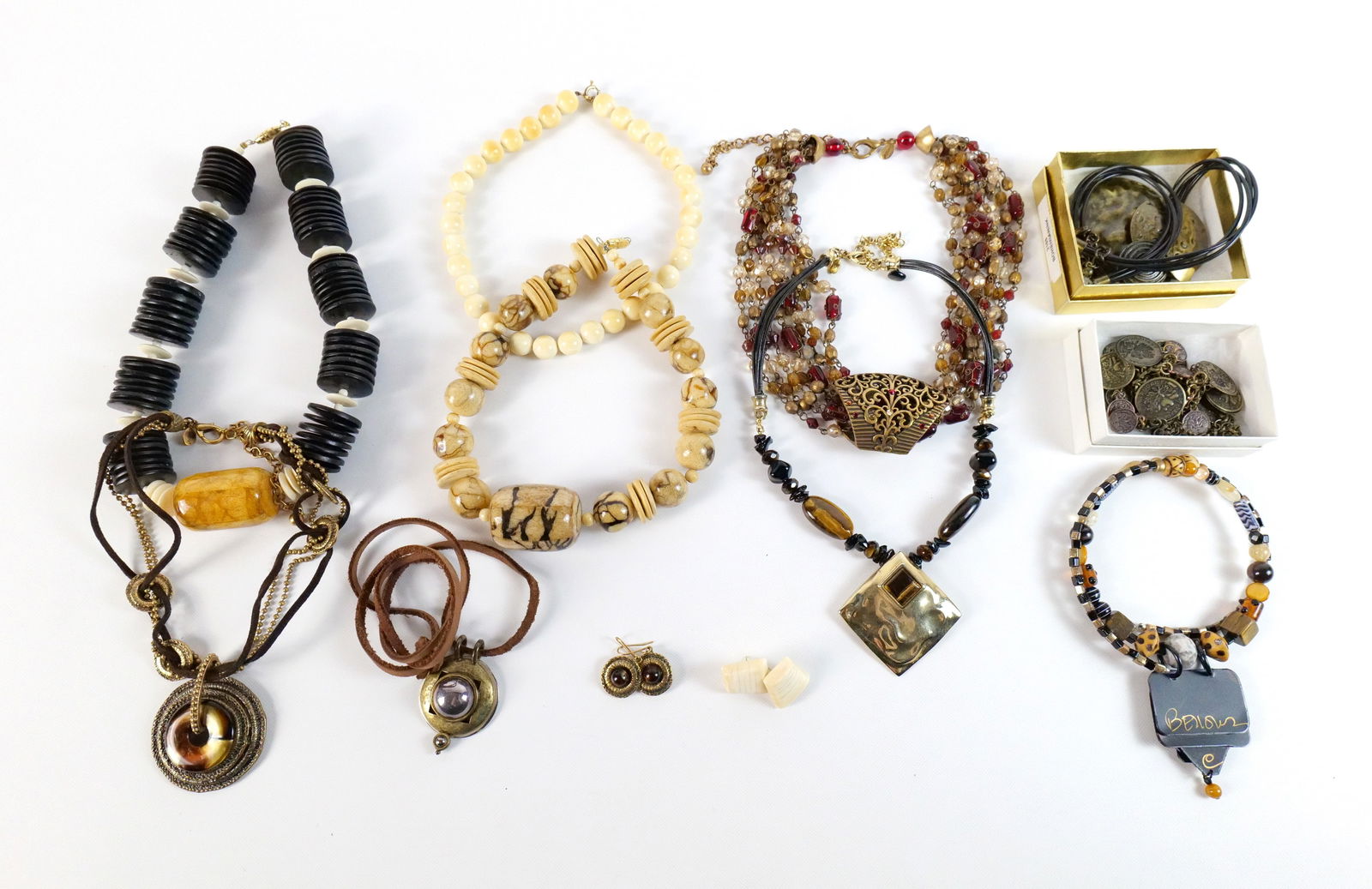 Large Mixed Group of Bohemian Jewelry: Large Mixed Group of Bohemian Jewelry. The lot includes a large mix of modern and vintage bohemian jewelry and more. Featuring an adjustable 23'' long necklace from Chico's made of 8 gathered strands