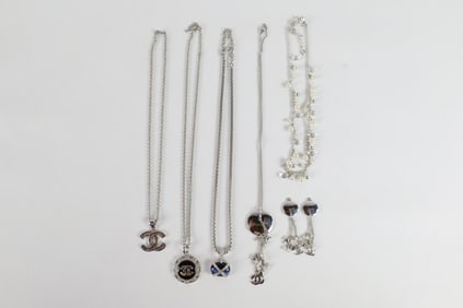 Group of Silver Tone Chanel Themed Jewelry