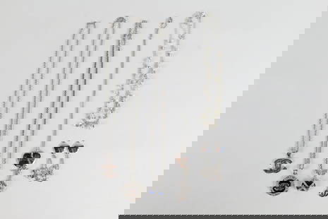 Group of Silver Tone Chanel Themed Jewelry: Group of Silver Tone Chanel Themed Jewelry. the lot includes a mix of silver tone Chanel themed fashion jewelry. Featuring an adjustable 21'' long chain with a 1.5''x 1'' circular Chanel logo pendant