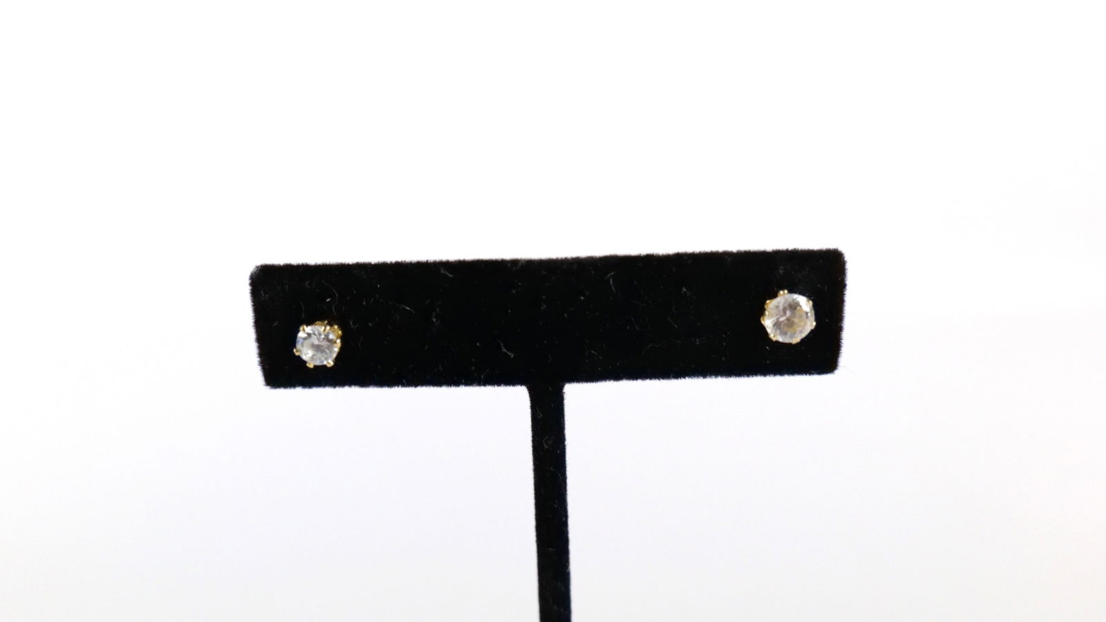 A Pair of Single Diamond Stud Earrings (1 of 4)