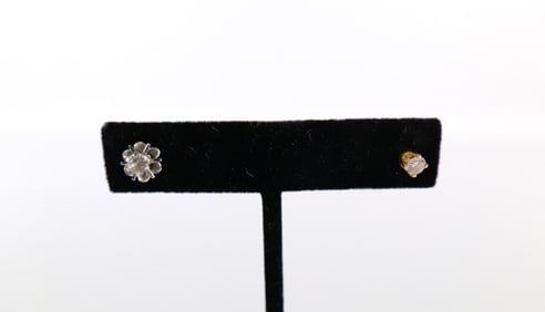 A Pair of Single Diamond Stud Earrings