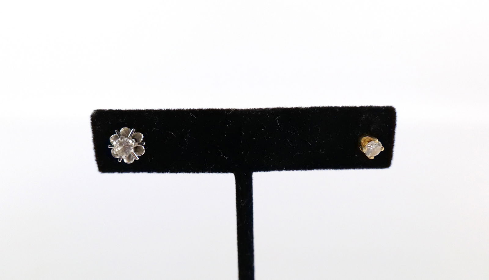 A Pair of Single Diamond Stud Earrings (1 of 4)